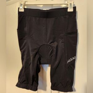 Two pair black women’s padded bike shorts, size M